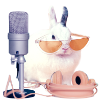 A white rabbit wearing influencer sunglasses sits behind a streamer's microphone and headphones.